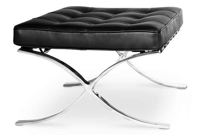Ottoman de diseño BARNA en similpiel negra con estructura K/D de pletina de acero inoxidable brillo. Disponible en otros colores. Certificado UNE.
