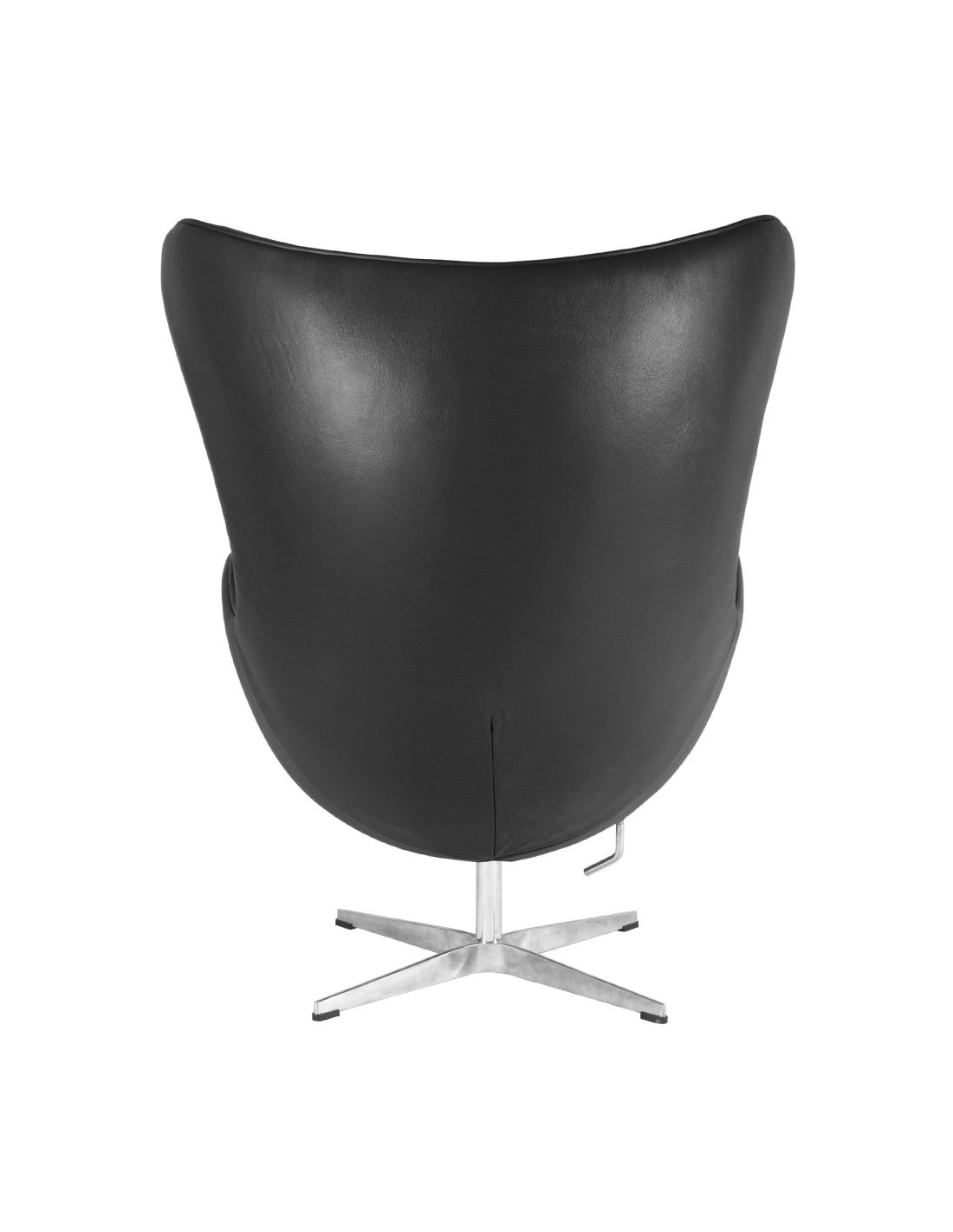 Sillón giratorio EG en similpiel negra — una pieza que redefine cualquier espacio con su silueta orgánica en fibra de vidrio, base cromada de alto brillo y mecanismo basculante. Elegancia definitiva y presencia inmediata.