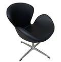 Sillón de diseño SW giratorio en similpiel negra con base de aluminio. Disponible en otros colores bajo pedido. Certificado UNE.